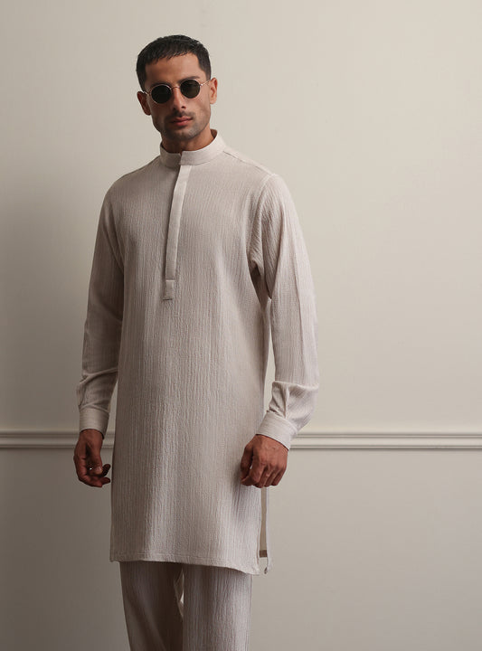 BEIGE TEXTURED LOOSE FIT KURTA PAJAMA