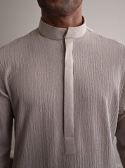 BEIGE TEXTURED LOOSE FIT KURTA PAJAMA